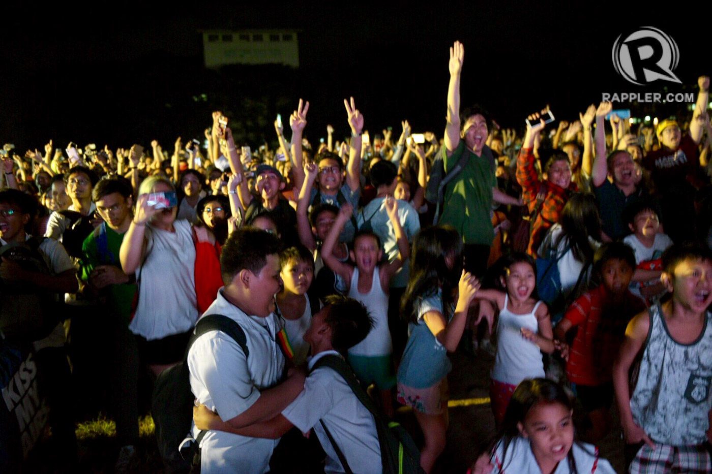 CHEERS. Fans erupt in cheers at the Sunken Garden in UP Diliman after the Maroons pull off an escape over the Falcons. Photos by LeAnne/Rappler   