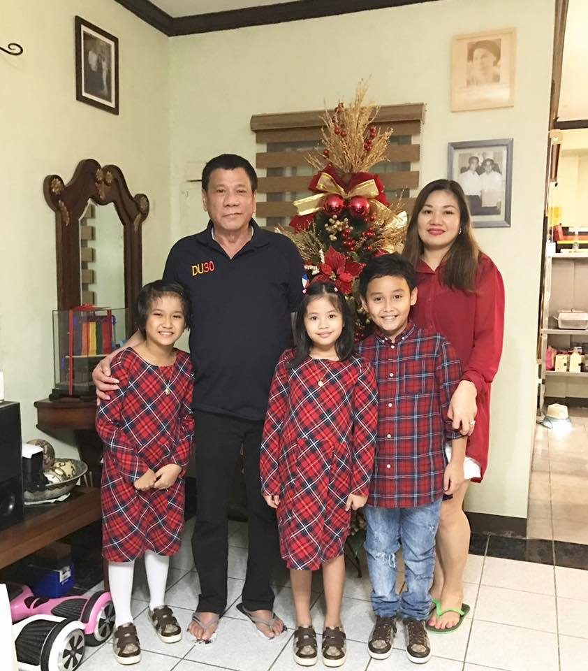 KIDDIE GUESTS. Duterte and common-law wife Honeylet Avanceña strike a pose with children. Photo courtesy of Rep Lord Allan Velasco   