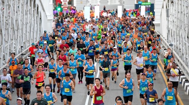 Filipino runners flock by thousands to historic Singapore Marathon