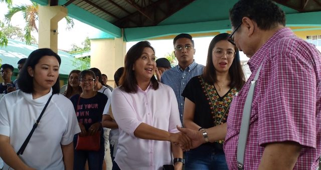VP IN NAGA CITY. Vice President Leni Robredo, with daughters Aika (left) and Tricia (right) at the Tabuco Central School, in Naga City. Photo by Abby Bilan 
