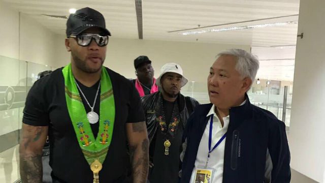 FLO RIDA IN MANILA. Rapper Flo Rida is in the Philippines to perform at the Miss Universe pageant. He's welcomed by Tourism assistant secretary Frederick Alegre.  Photo courtesy of the Department of Tourism  