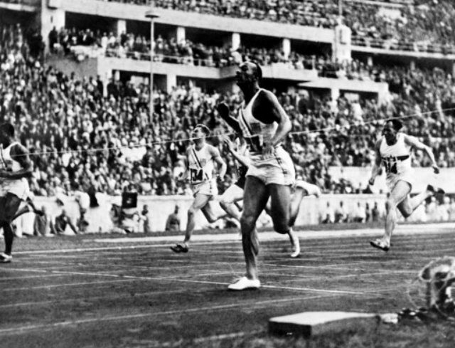 Jesse Owens crosses the finish line of the 100m event 1936 during Olympic Games in Berlin. File photo by AFP 