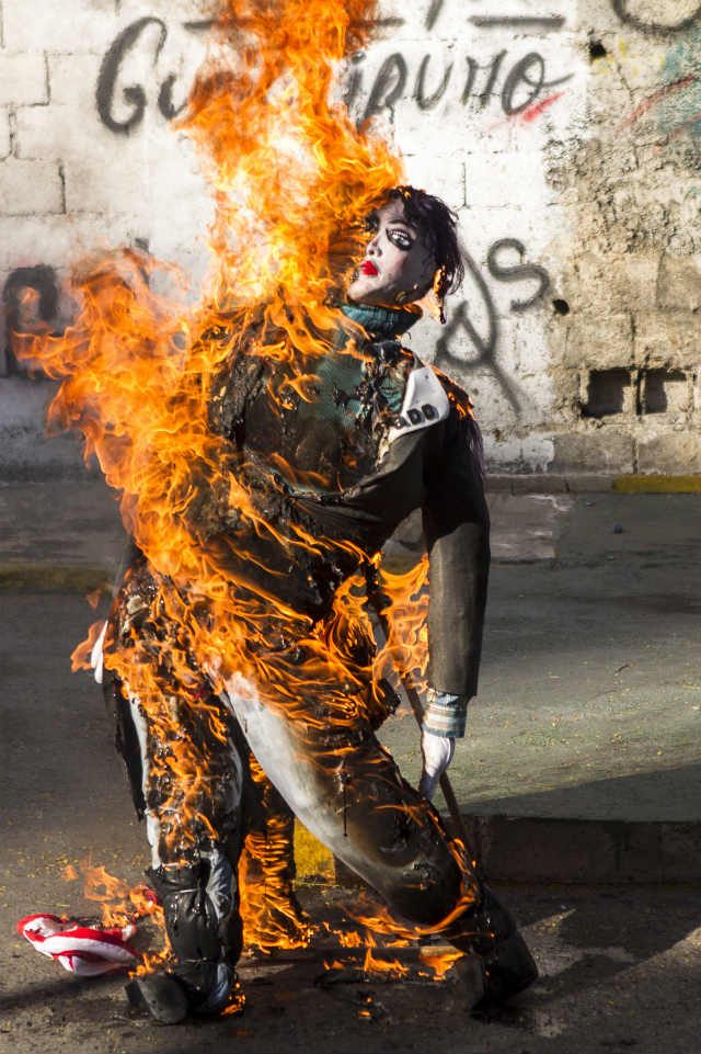 MORE PROTESTS. A figure with the image of Venezuelan opposition leader and former legislator Maria Corina Machado is seen in flames during the tradition of the Burning of Judas in Capuccinos sector, in Caracas, Venezuela, April 20, 2014. Photo by Santi Donaire/EPA