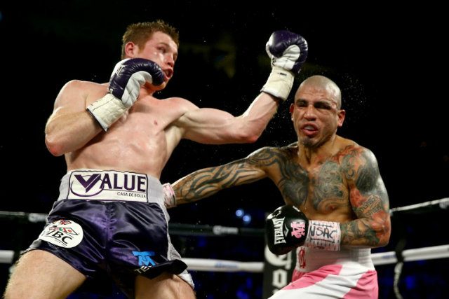 Canelo Alvarez outslugs Miguel Cotto to win middleweight title