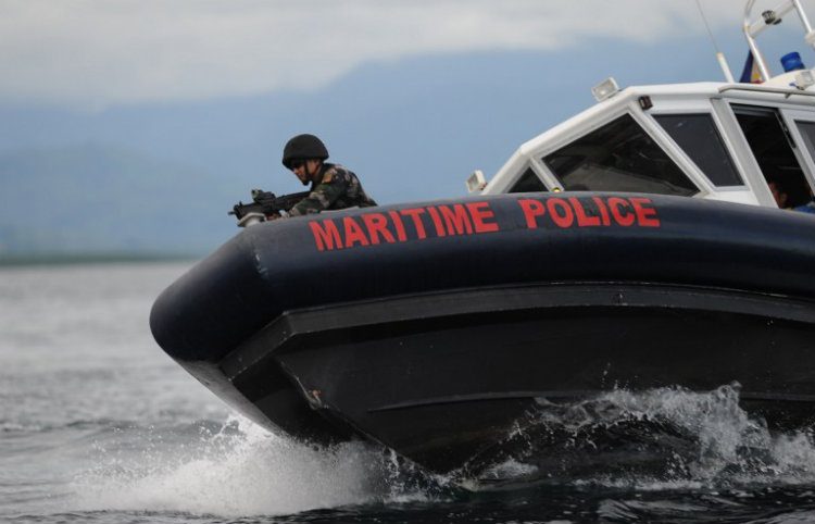 MARITIME POLICE. In this photo taken on June 6, 2014, members of Philippine Maritime police special boat unit, riding on US-made gun boats, maneouver as they simulate an apprehension of poachers during a training exercise off Honda Bay in Puerto Princesa, Palawan island, southwest of Manila. Photo by Ted Aljibe/AFP