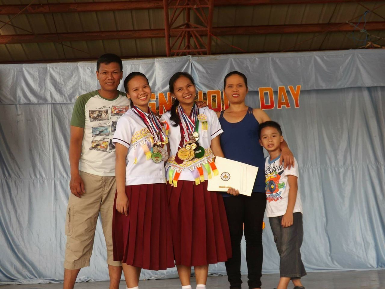 HARD WORK. Trisha Marie and Earl Joy dedicate their achievements to their parents to thank them for their sacrifices and hard work