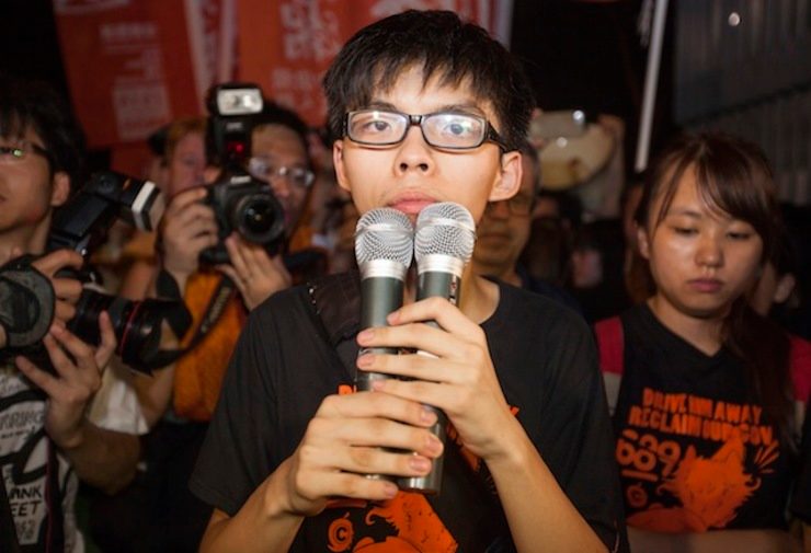 Student leader Joshua Wong Chi-fung of the Scholarism group speaks during a protest outside of the Hong Kong Chief Executive's Office after the annual anti-Hong Kong government protest rally, in Hong Kong, China, 01 July 2014. Alex Hofford/EPA