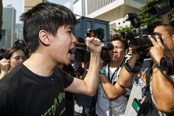 Scuffles as Hong Kong students escalate democracy strike