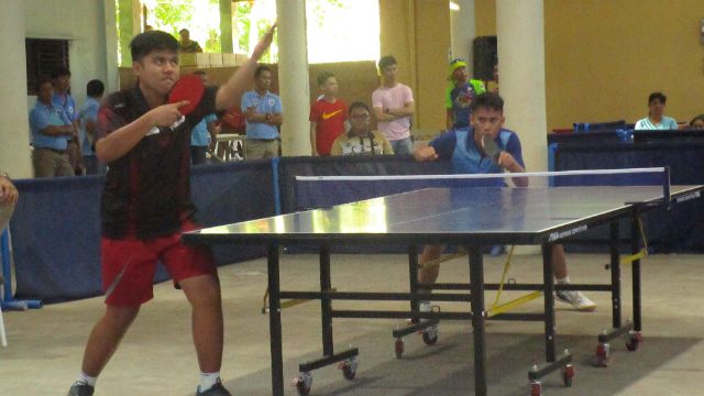 GAME FACE. Calabarzon athlete gets ready to set the game as Ramiro of the National Capital Region waits to outrun the former's score during the second set of the finals for secondary boys table tennis singles at the 2017 Palarong Pambansa. Photo by Regine Villafuerte/ Rappler 