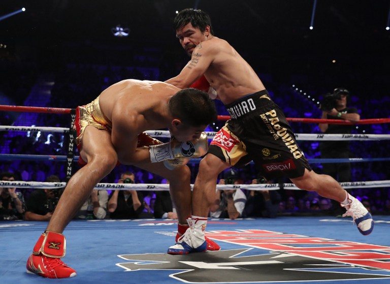 Pacquiao pounds Vargas to win WBO welterweight title