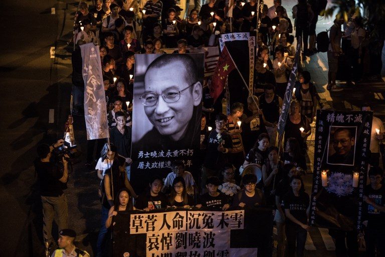 Thousands march in Hong Kong in memory of Liu Xiaobo