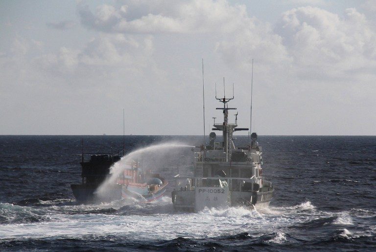 Taiwan uses water cannon to drive off Vietnamese boat