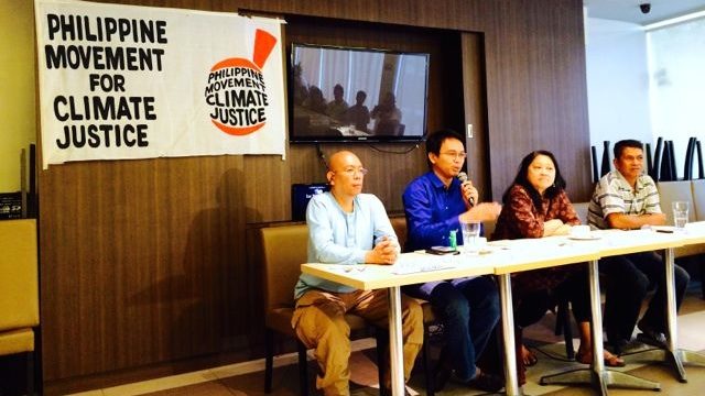 CLIMATE ACTION. Members of the Philippine Movement for Climate Justice announce they will march to Malacañang as Aquino and Hollande meet on Thursday, February 26. Photo by Voltaire Tupaz/Rappler   