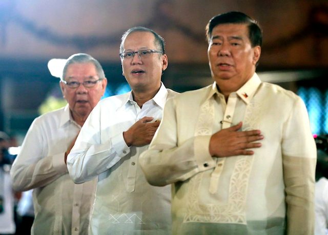 AQUINO AND ALLIES. President Benigno Aquino III (flanked by allies Senate President Franklin Drilon and Speaker Feliciano Belmonte) sings the national anthem at a Palace 'agenda-setting' dialogue on September 12, 2014. Photo by Malacanang Photo Bureau