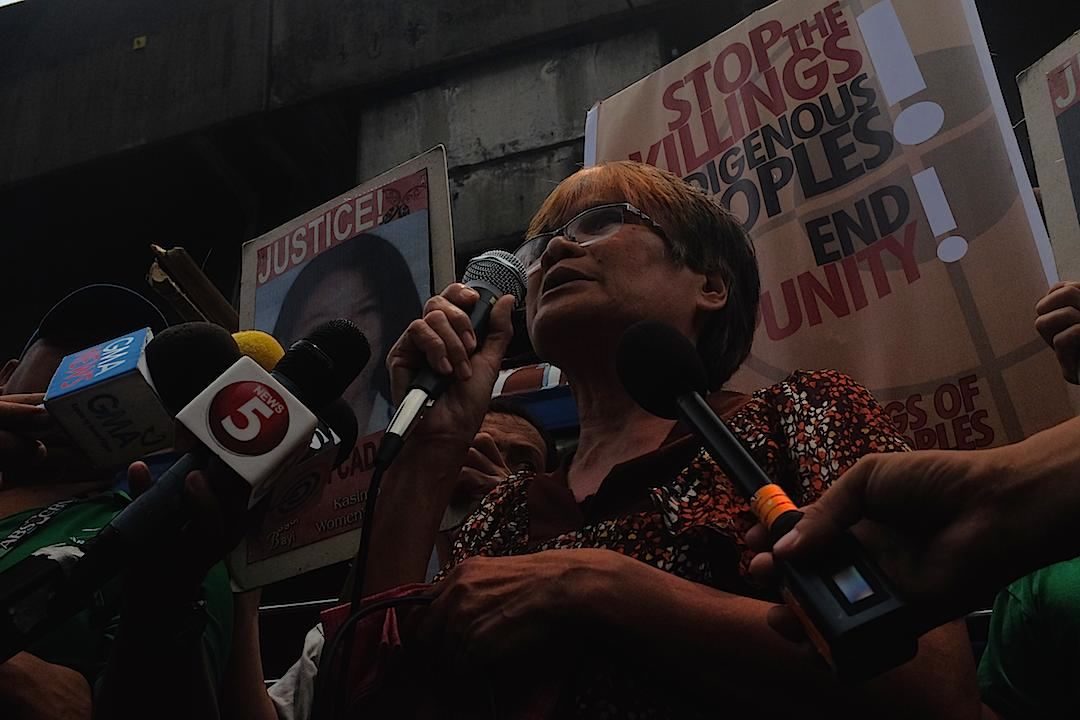 PAYMENT IN BLOOD. Linda Cadapan, mother of disappeared UP activist Sherlyn Cadapan, speaks at a rally before the NBI where Jovito Palparan is being held. Photo by Patricia Evangelista/Rappler 