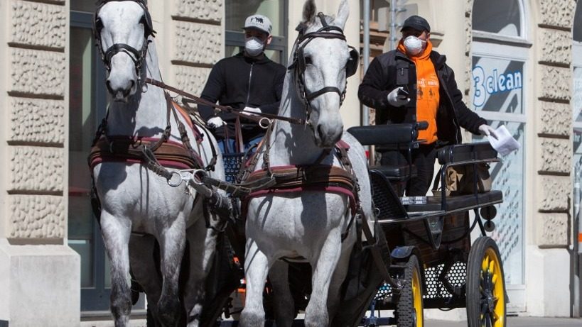 Vienna’s horse-drawn carriages ride again – for food delivery