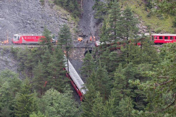 Swiss train carriage plunges into ravine after landslide