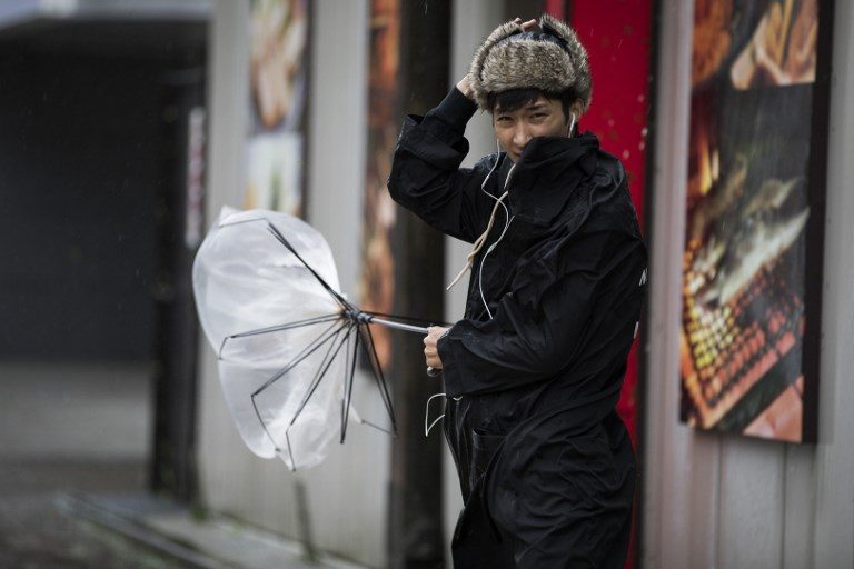 Typhoon Trami pounds Japan, dozens injured