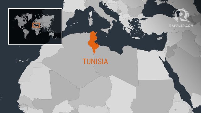 Tunisians clash with police after journalist sets himself on fire
