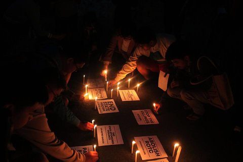 CANDLE. Students of UP Baguio hold a candle lighting ceremony at the parking lot in a protest action led by the League of Filipino Students – Metro Baguio, Anakbayan UPB Chapter, and Alliance of Concerned Students. Photo by Reginald Flores  