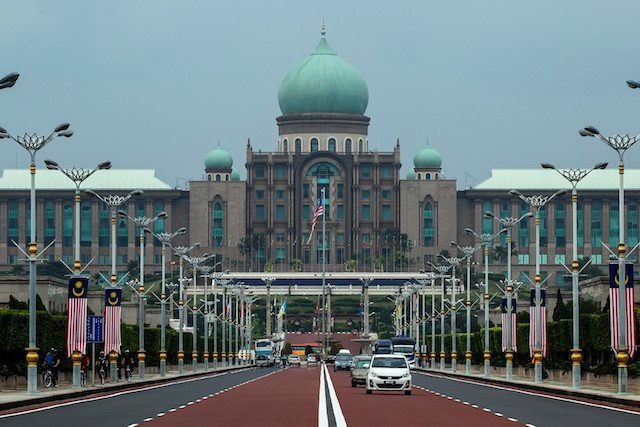 New Malaysia security law debuts as Najib fights critics