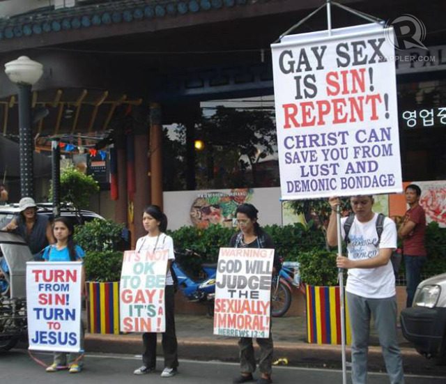 HOMOPHOBIA. Bashers seeking to convert marchers show up every year during the pride parade. Photo by Karen Cruz 