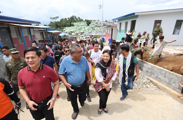 NEW HOMES. Vice President Leni Robredo is accompanied by local officials, including Marawi Mayor Majul Usman Gandamra (left) at the Angat Buhay Village on June 28, 2019. OVP photo 