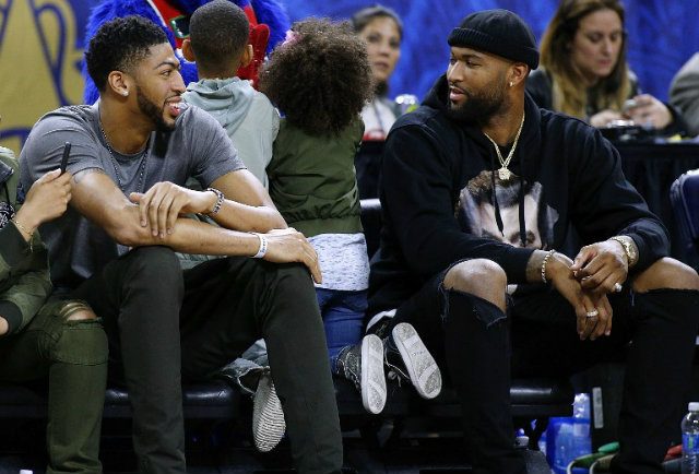 BLOCKBUSTER TRADE. DeMarcus Cousins (R) is traded from the Sacramento Kings to the New Orleans Pelicans. He is seen here speaking with Pelicans star Anthony Davis during the NBA All-Star Celebrity Game on February 17, 2017 in New Orleans, Louisiana. Jonathan Bachman/Getty Images/AFP  