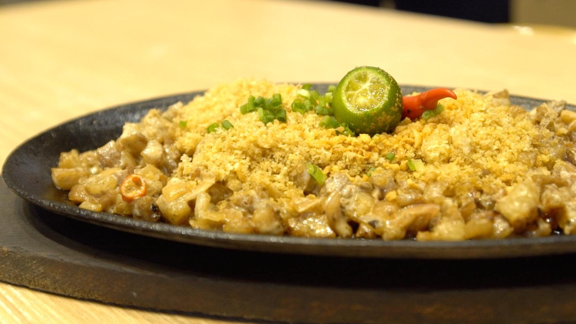 WATCH: How Manam’s House Crispy Sisig is made