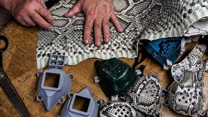 Florida craftsman makes face masks from python skin