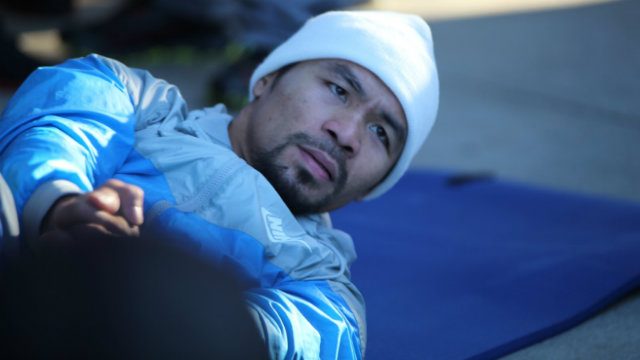 Manny Pacquiao works on his abs after running