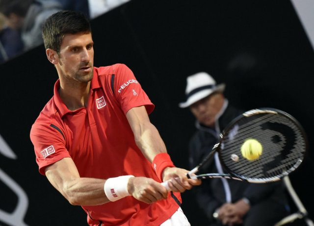 Djokovic shakes off ankle injury, sets up Murray final in Rome