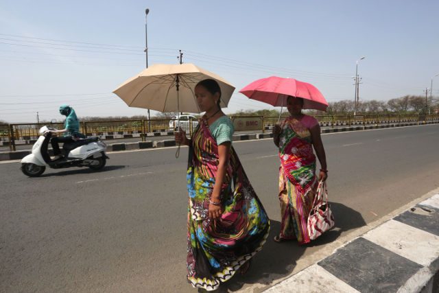 Rain brings relief as India heatwave death toll tops 2,200