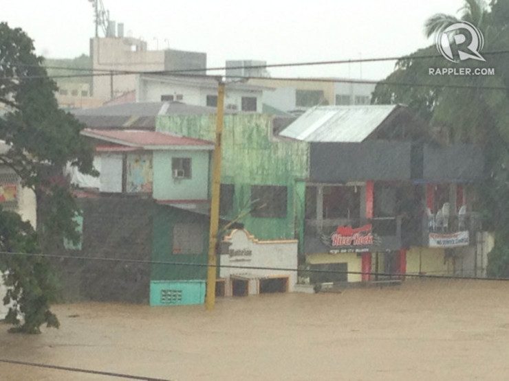 FLOODED. First levels of buildings along Marikina River are submerged