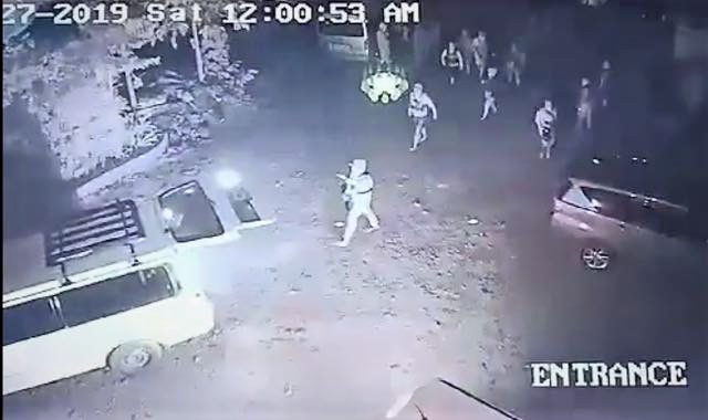 ARMED MEN. A video grab of the CCTV footage outside the Jalandoni residence in Canlaon City, Negros Oriental shows heavily armed men who break into the property. 
