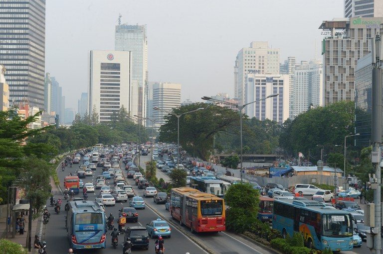 JAKARTA TRAFFIC. Jakarta authorities are just the latest to target Uber, an app that has sparked protests from taxi drivers in several countries as it allows customers to hail private rides via their phones. AFP PHOTO / ADEK BERRY