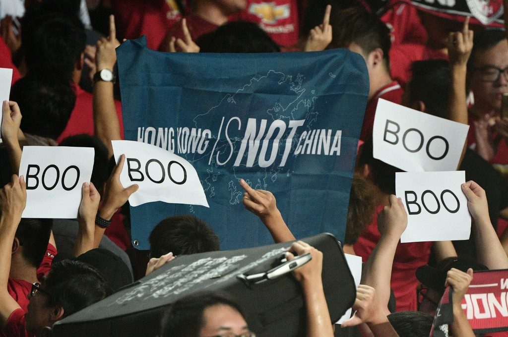 Protestors boo Hong Kong anthem during football World Cup qualifier