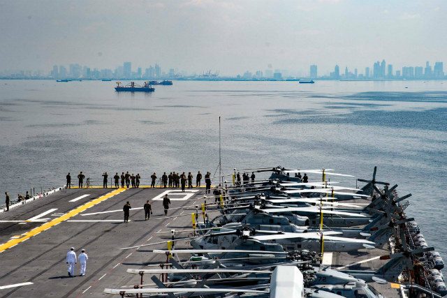 PORT VISIT. USS Bonhomme Richard transits into Manila for a scheduled port visit. US Navy photo by Mass Communication Specialist 2nd Class William Sykes 