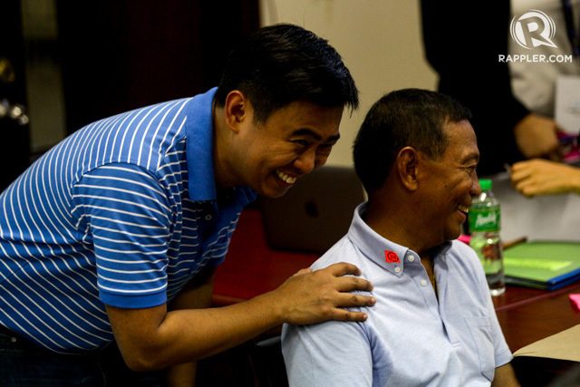 FATHER AND SON. The Vice President shares a laugh with his son Junjun as the elder Binay files his certificate of candidacy for president on October 12. Photo by Czeasar Dancel/Rappler 