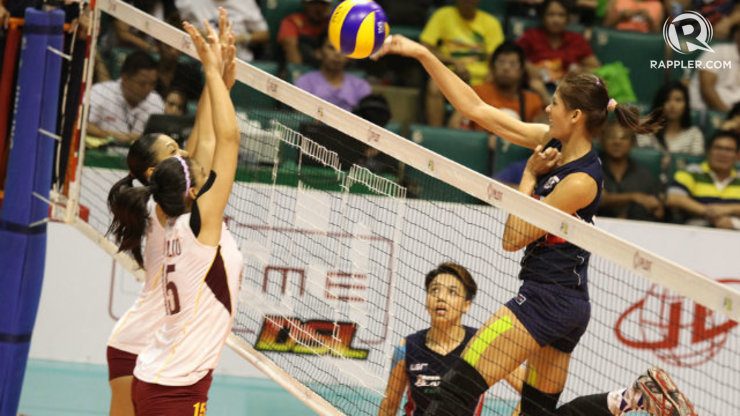 Dindin Santiago smashes in a point against Cagayan. Photo by Josh Albelda