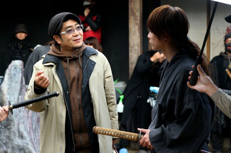 KEISHI AND TAKERU. Director Keishi Otomo guides Takeru Satoh during filming. Photo courtesy of Warner Bros 