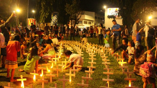 Survivors light candles to commemorate Yolanda anniversary