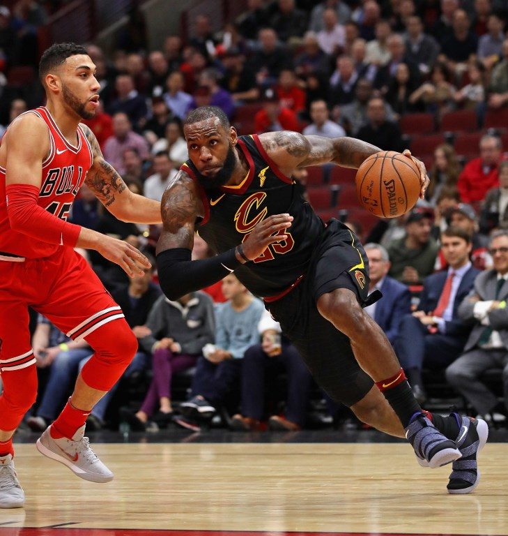 12 in a row as Love, James lead Cleveland Cavs past Chicago Bulls