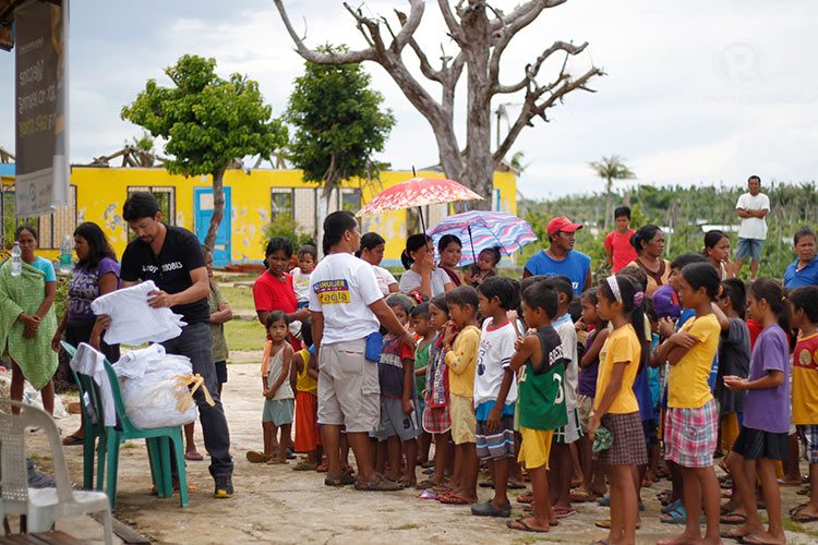 FOR KIDS. First shirt distribution at Barangay Cogon Elementary School on May 30, 2014.