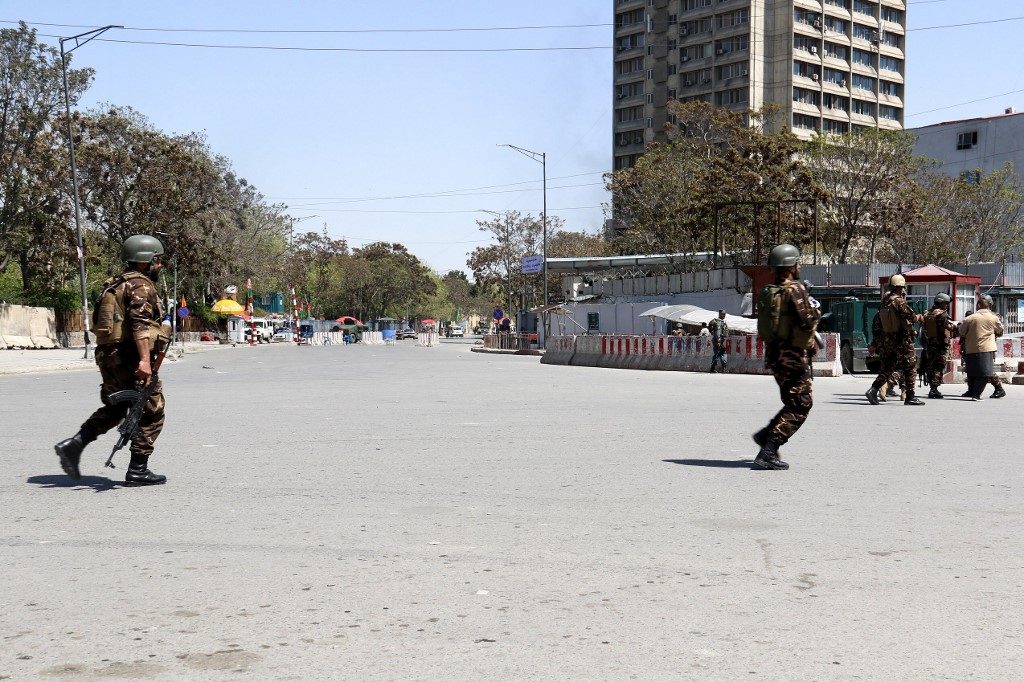 Suicide bombers attack Afghan ministry in downtown Kabul