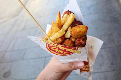 HEAVY SNACK. This cone with Belgian fries, nuggets, fried chicken, and fish sticks cost only 8 euros. Photo by Don Kevin Hapal/Rappler 