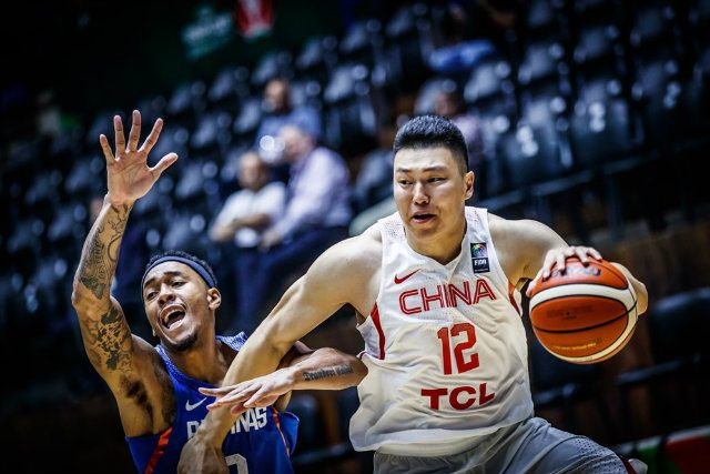 BEAST. Calvin Abueva and Li Gen going at it in the opening period. Photo from FIBA.com 