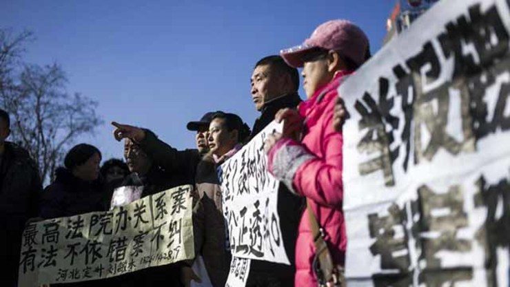 Chinese man seeking $2.4M for wrongful death sentence