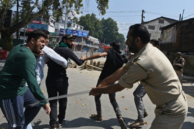India tightens Kashmir lockdown over Muslim processions