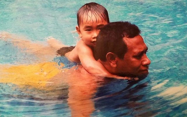 FATHER AND SON. Maun Nando and son Hadomi enjoy a swim. Photo from Joy Siapno  